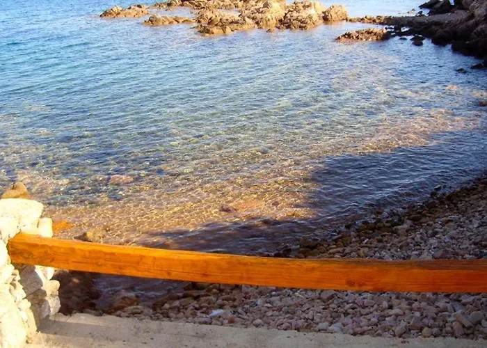 Nyaraló Casa Mughetto R5055 Wifi, Seafront, Private Sea Access, Swimming Pool La Maddalena